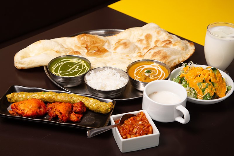 Traditional Indian meal spread at Milan Restaurant